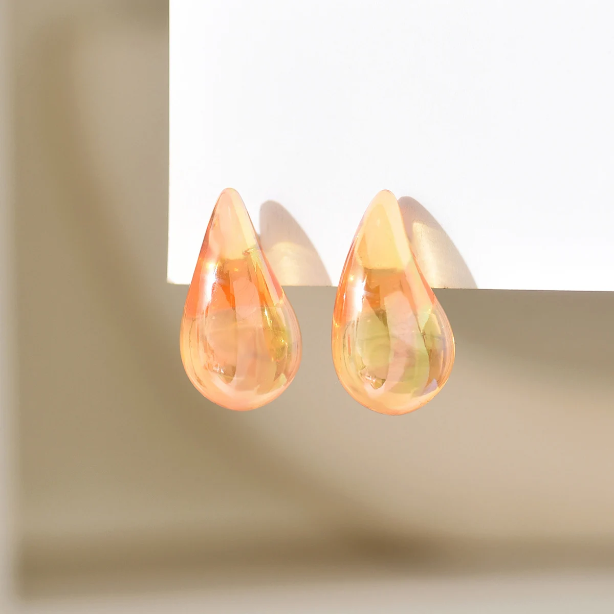 Boucles d'oreilles resine gouttes oranges
