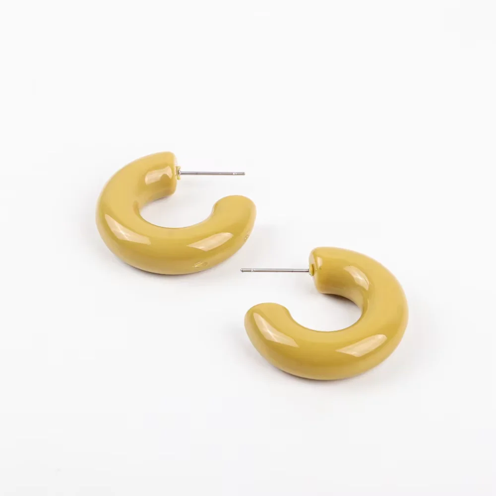Boucles d'oreilles résine jaunes design